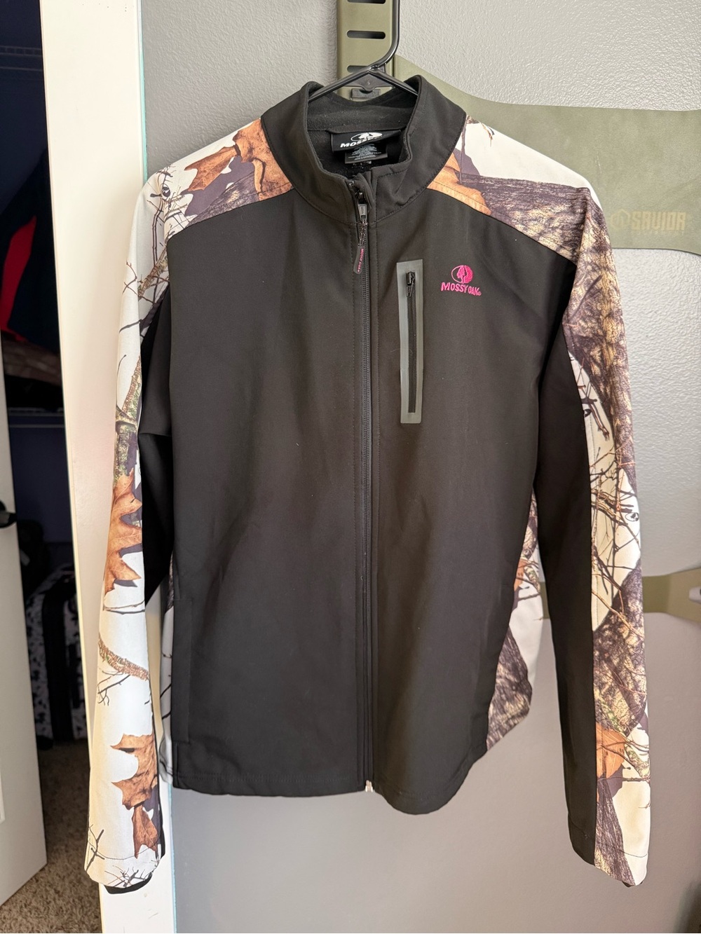 Mossy Oak Black Jacket with Camo Sleeves and Pink Logo